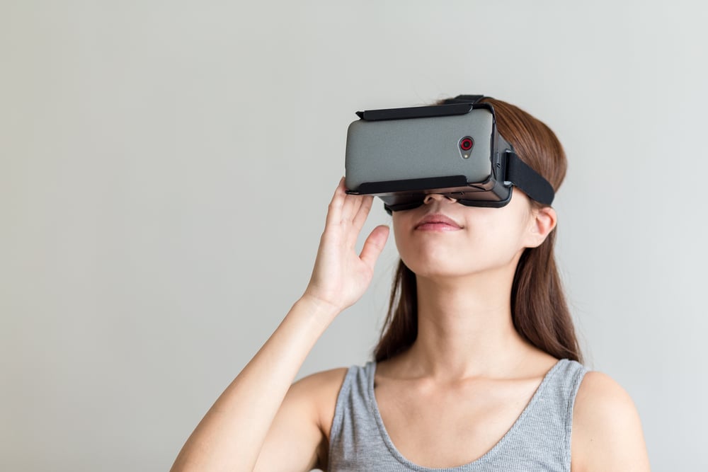 Woman using the virtual reality headset