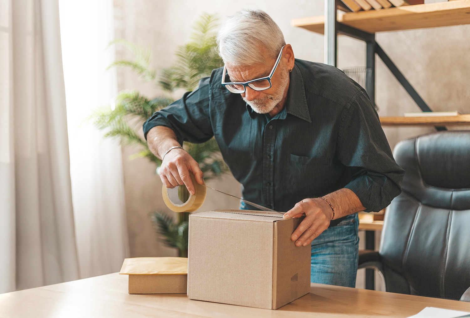 A man is preparing the item for return